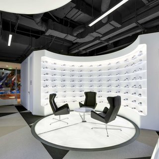 Modern triangle patterned flooring in the lounge area at the office of Adidas in Shanghai, China