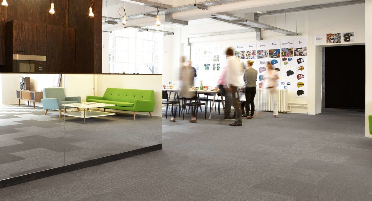 Grey Bolon woven vinyl floor tiles in the office of 18 Feet and Rising in London, UK